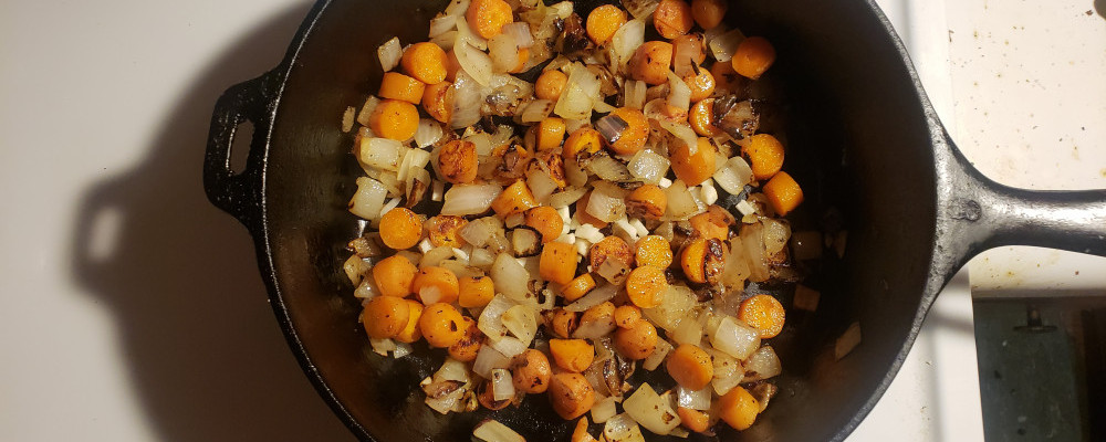 Onions and carrots cooking