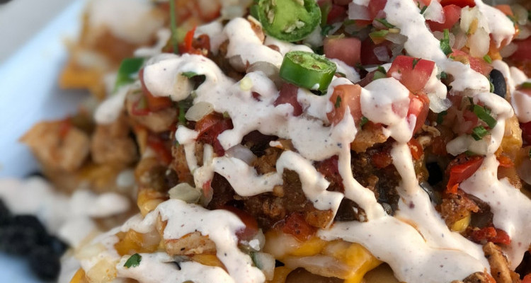 Taco skillet served over tortilla chips