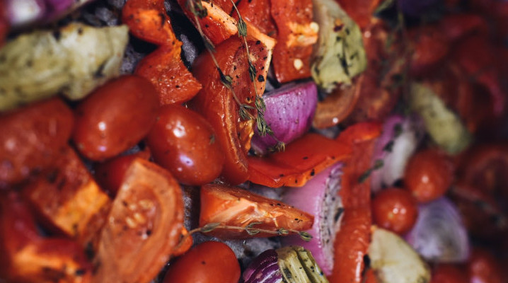 Tomatoes and onion cooking